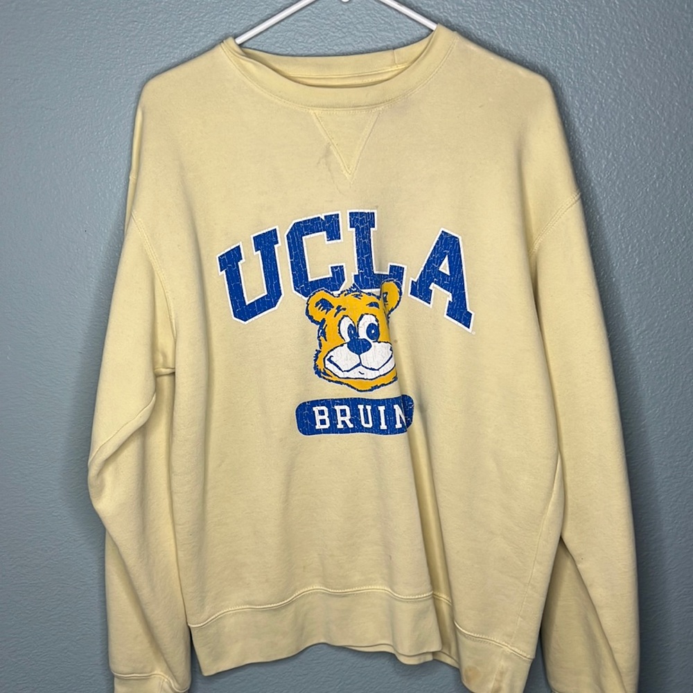 UCLA yellow sweater